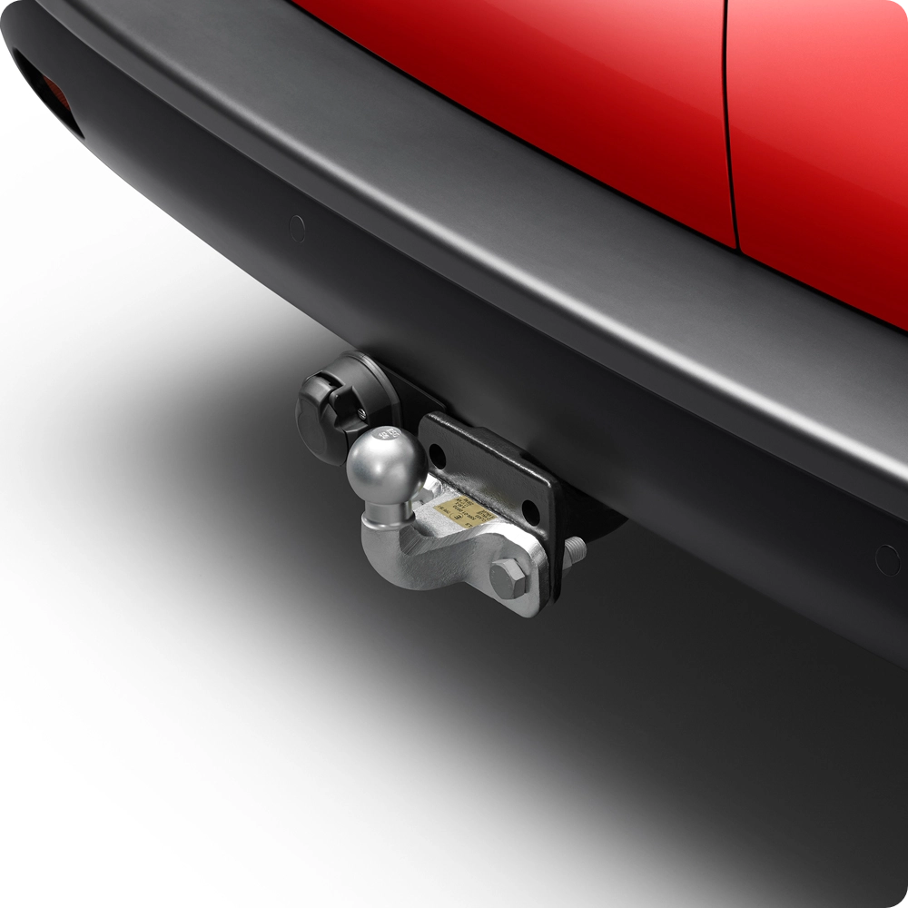 Vista ravvicinata posteriore di Citroën ë-Jumpy con gancio di traino, che valorizza la sua capacità di traino e la praticità dell’equipaggiamento.