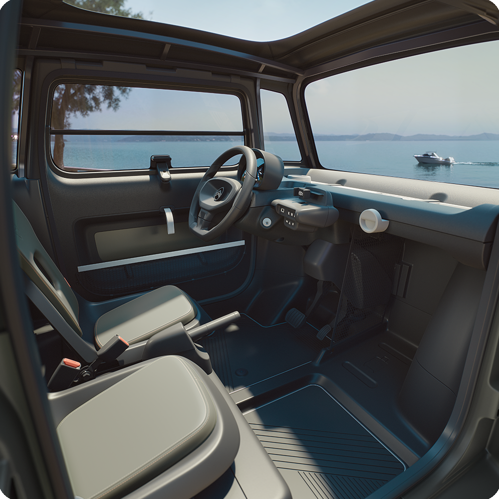 Vista dell’abitacolo della Citroën Ami Outdoor con interni aperti, una microcar elettrica pratica per la mobilità quotidiana
