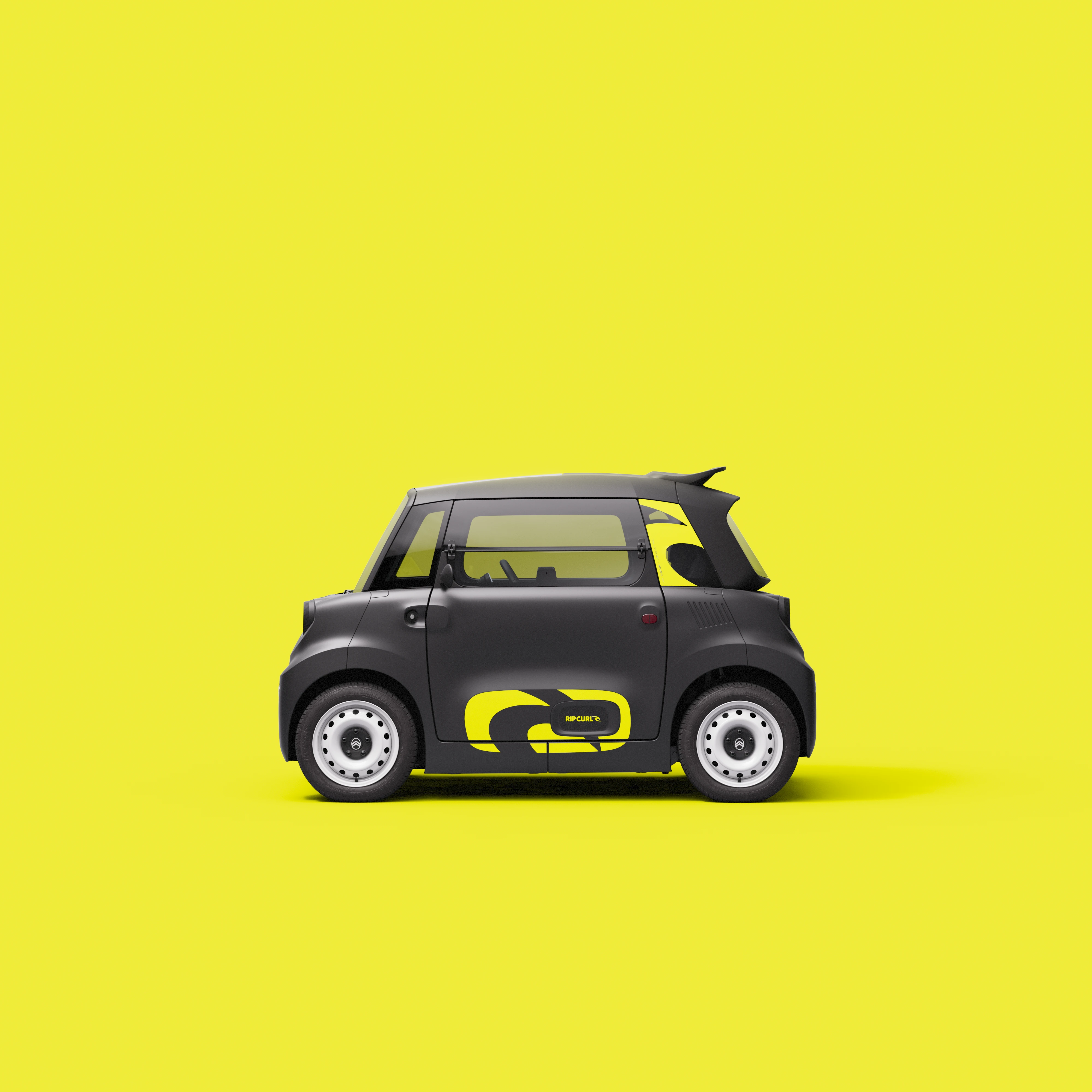 Vista laterale di profilo Citroën Ami x Rip Curl elettrica senza patente, Citroën Ami compatta per mobilità urbana elettrica