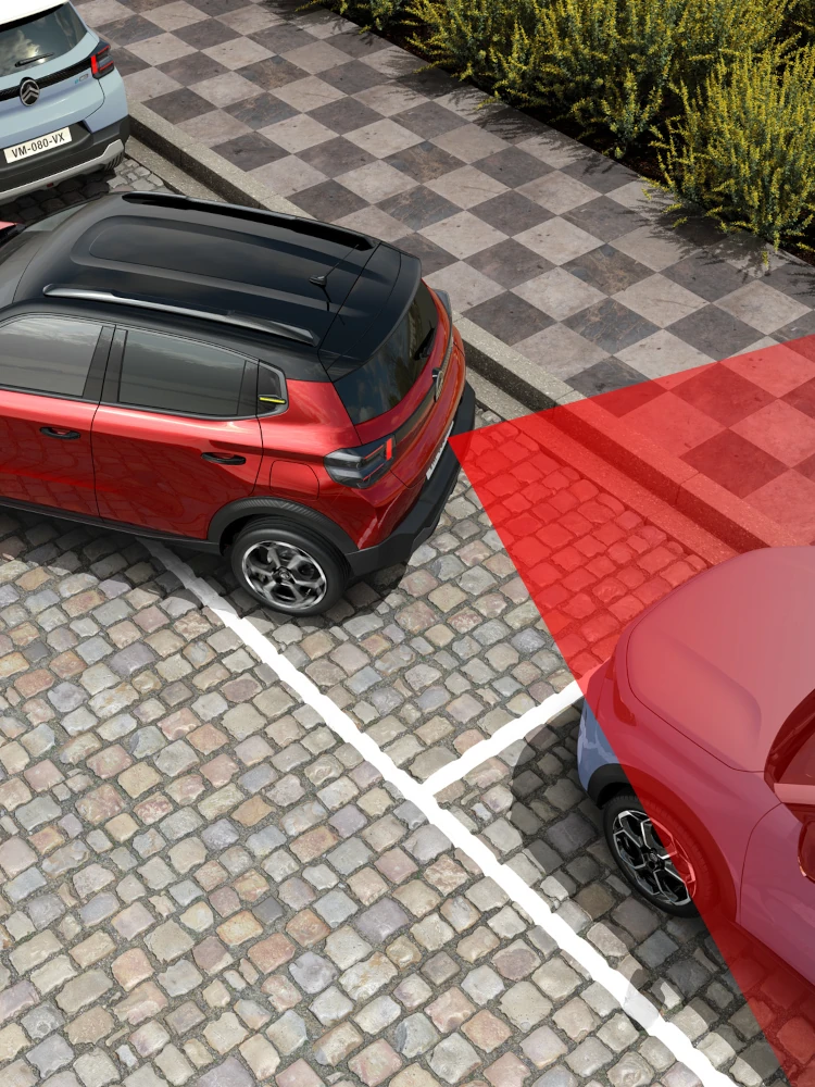 Vista dall’alto di Citroën ë-C3 che evidenzia i sensori di parcheggio posteriori, per manovre urbane più sicure, precise e accessibili.