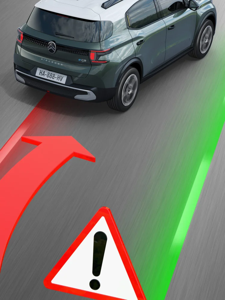 Vista posteriore su strada di Citroën C3 Aircross che mette in risalto l’avviso di superamento involontario della corsia, per una mobilità più sicura, controllata e accessibile.