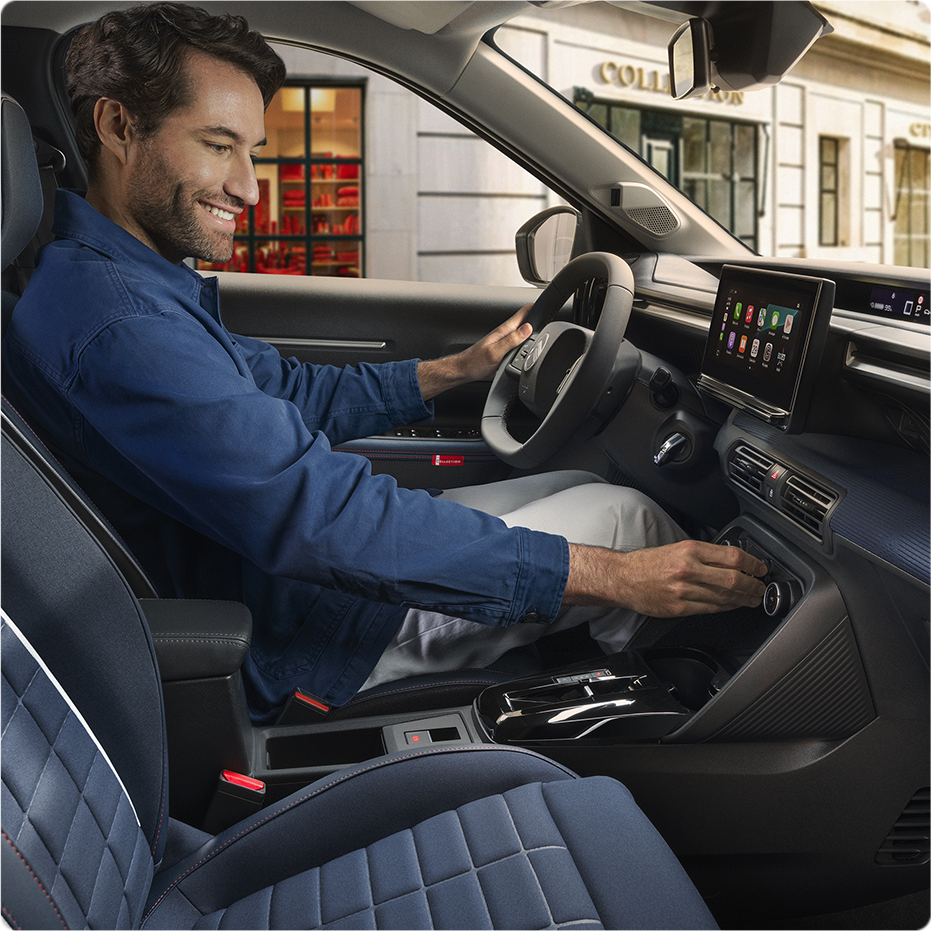 Interior view featuring multimedia touchscreen, ergonomic dashboard controls and connected driving experience